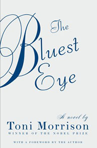 Cover of "The Bluest Eye" by Toni Morrison, featuring elegant blue cursive text on a light gray background.