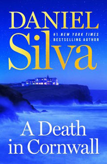 Book cover of "A Death in Cornwall" by Daniel Silva, showing a cliffside building under a blue night sky with waves crashing below.