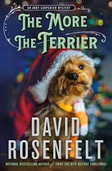 Book cover of "The More the Terrier" by David Rosenfelt featuring a terrier dog in a Santa hat and scarf.