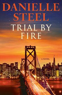 Cover of "Trial by Fire" by Danielle Steel, showing a lit bridge and city skyline at sunset.