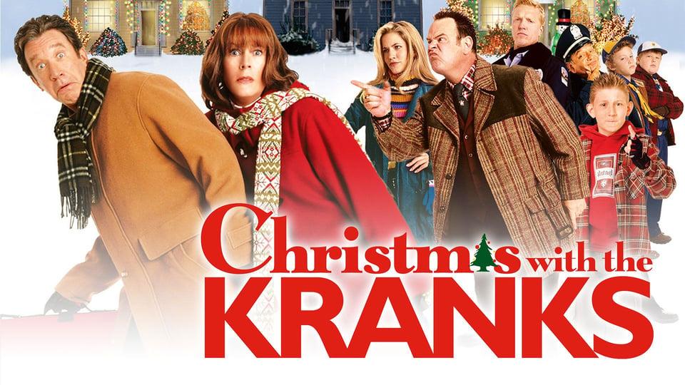 A group of people in winter clothing with a snowy backdrop, featuring the title "Christmas with the Kranks.