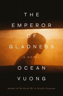 Book cover for "The Emperor of Gladness" by Ocean Vuong, featuring a person's silhouette in warm light.