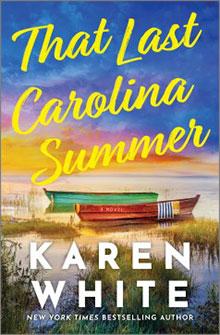 A colorful rowboat rests on marshy grass under a vibrant sunset sky; text reads "That Last Carolina Summer.