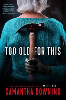 A woman in a teal sweater holds a hammer behind her back; text reads "Too Old For This" by Samantha Downing.