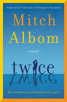 Book cover for "Twice" by Mitch Albom, showing a couple embracing against a blue background with water reflections.