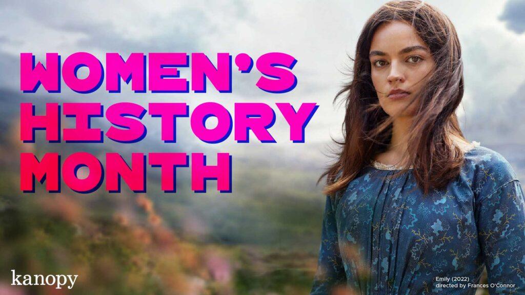 Woman in a blue dress with long hair stands in nature; bold pink text reads "Women's History Month.