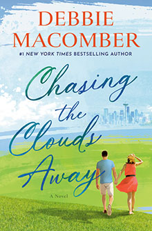 Book cover for "Chasing the Clouds Away" shows a couple walking in a grassy field toward a distant city skyline.