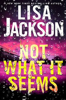 Book cover for "Not What It Seems" by Lisa Jackson with raindrops and a purple-pink sky in the background.