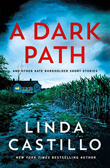 Book cover for "A Dark Path" by Linda Castillo, showing a house near a cornfield under a dark, cloudy sky.