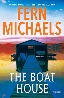 Book cover for "The Boat House" by Fern Michaels, showing a dock leading to a house over a lake at sunset.