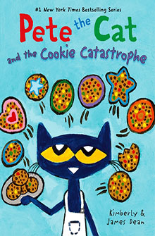 A blue cat in an apron holds cookies, with colorful cookies floating around on a bright book cover.