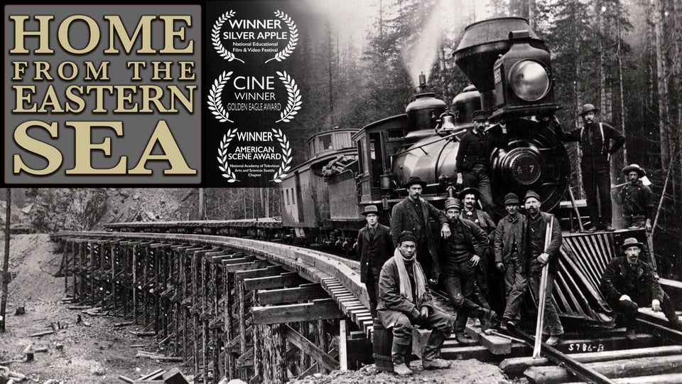 Vintage photo of railroad workers in front of a steam train, with text "Home From the Eastern Sea" and award logos.