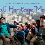 A smiling man in a captain’s hat sits with a group of smiling children outdoors, promoting Arab Heritage Month.