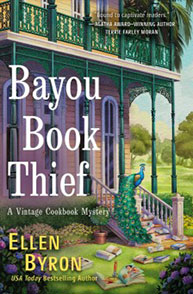 Cover of the book "Bayou Book Thief" by Ellen Byron, showing a woman on a porch with trees in the background.