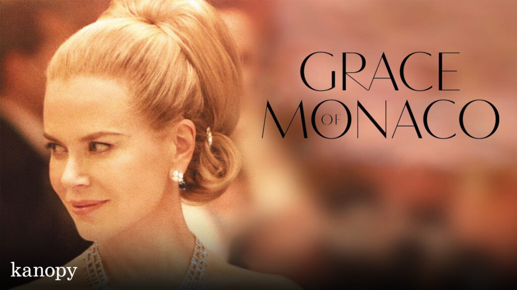 A woman in formal attire with styled blonde hair and pearl earrings, with "Grace of Monaco" text beside her.
