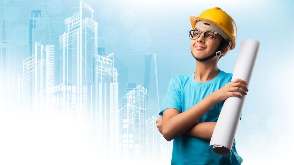 Smiling boy in a hard hat holds blueprints with city building sketches in the background.