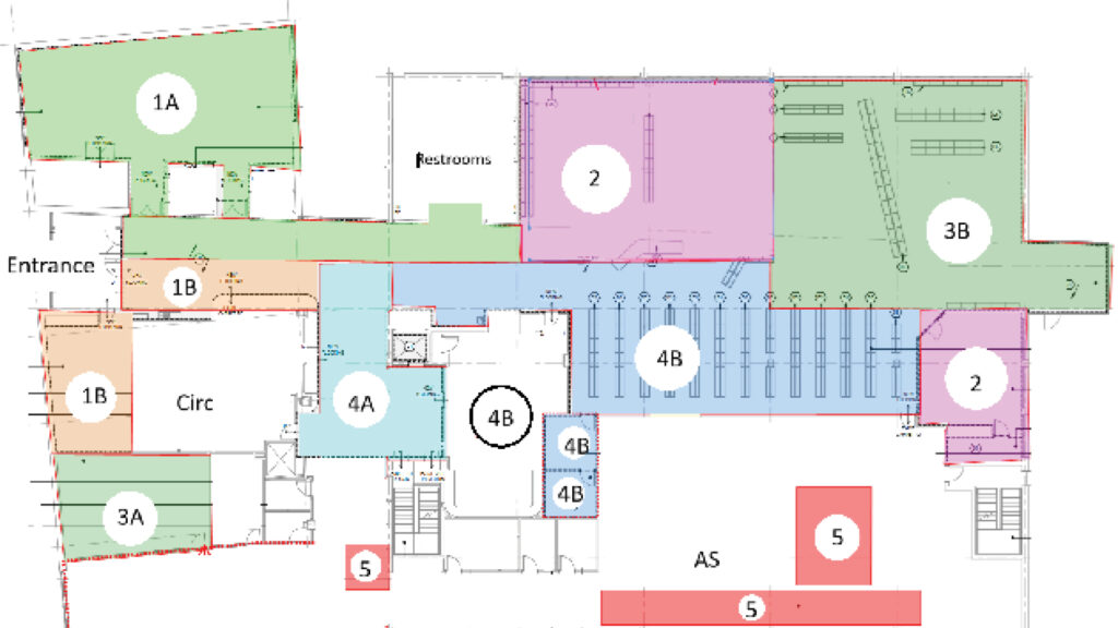 Color-coded floor plan with labeled sections, rooms, entrance, restrooms, and stairways visible.