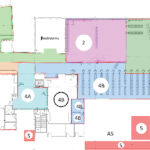 Color-coded floor plan with labeled sections, rooms, entrance, restrooms, and stairways visible.