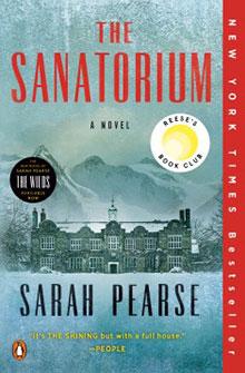 Book cover of "The Sanatorium" by Sarah Pearse, featuring a snow-covered building with mountains in the background.