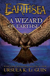 Book cover of "A Wizard of Earthsea" by Ursula K. Le Guin, featuring a bird with outstretched wings against a blue background.