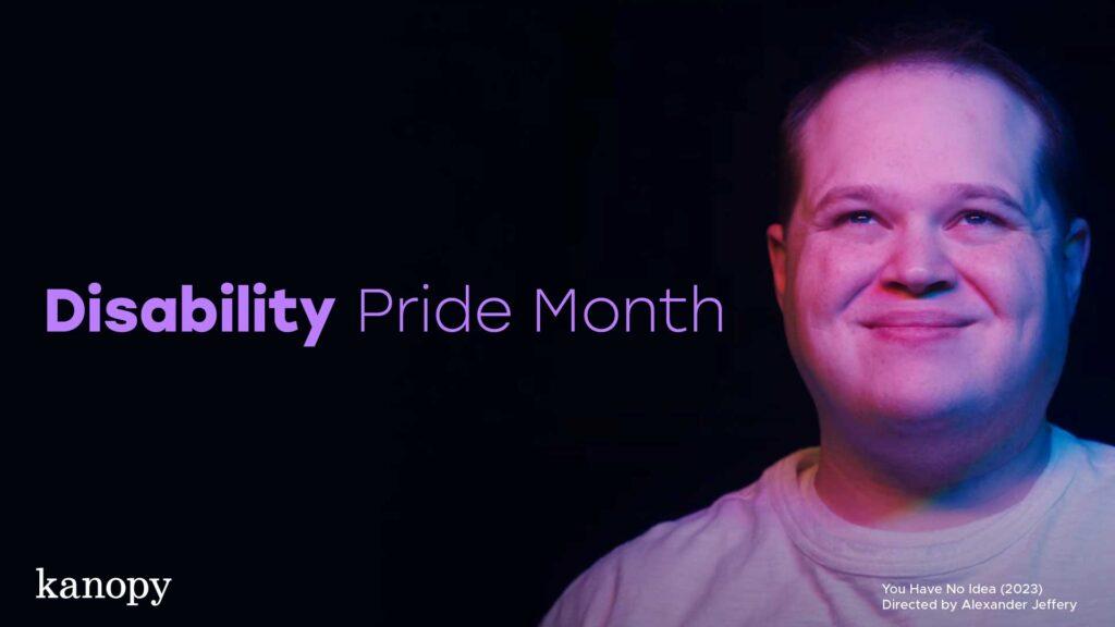 Smiling man in purple light with text: "Disability Pride Month." Kanopy logo in the corner.