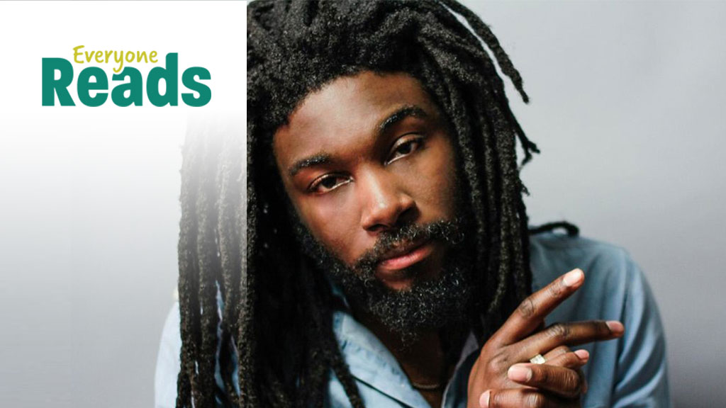 A person with long dreadlocks looks at the camera with a hand making a gesture. Text: "Everyone Reads" on the left.