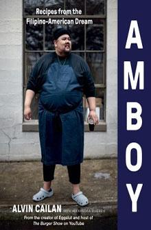 Cover of "Amboy" with a man in an apron and Crocs, standing against a wall. Text: "Recipes from the Filipino-American Dream.