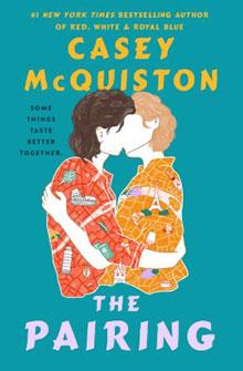 Illustration of two people kissing on a colorful book cover titled "The Pairing" by Casey McQuiston.