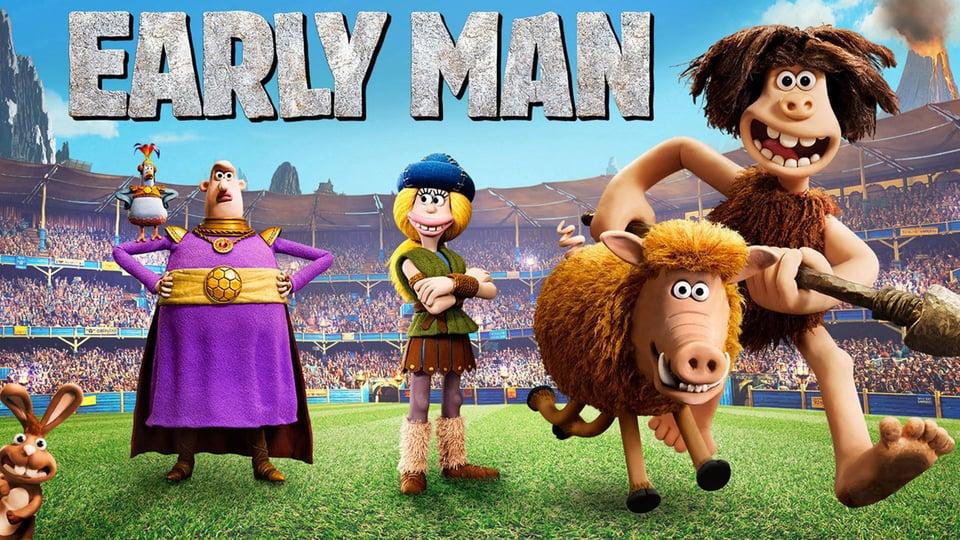 Animated characters from "Early Man" stand on a grassy field, including a caveman holding a club and a woolly mammoth.