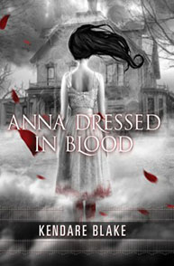 Book cover: A girl in a white dress with flowing hair stands before a haunted house. Title: "Anna Dressed in Blood".