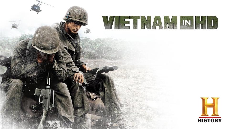 Two soldiers in combat gear sit with rifles; helicopters fly above. Text: "VIETNAM IN HD." History Channel logo.