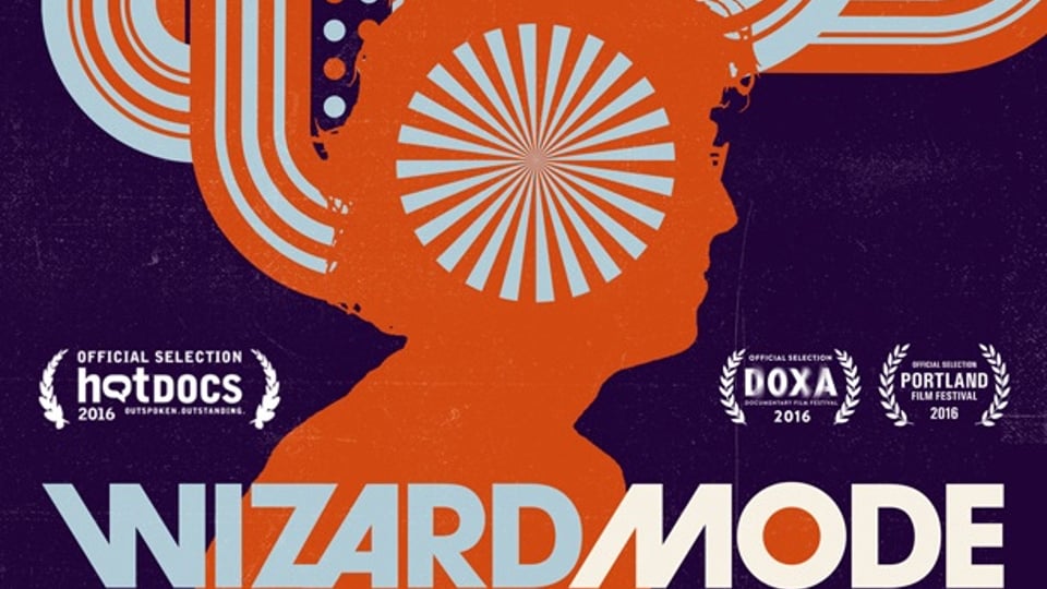 A graphic of a silhouette with colorful patterns and text promoting the film "Wizard Mode" with festival selections.