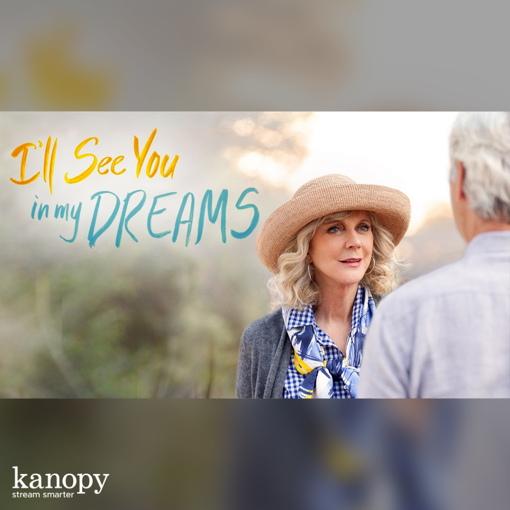 A woman in a hat talks to a man outdoors with "I'll See You in My Dreams" written beside them.