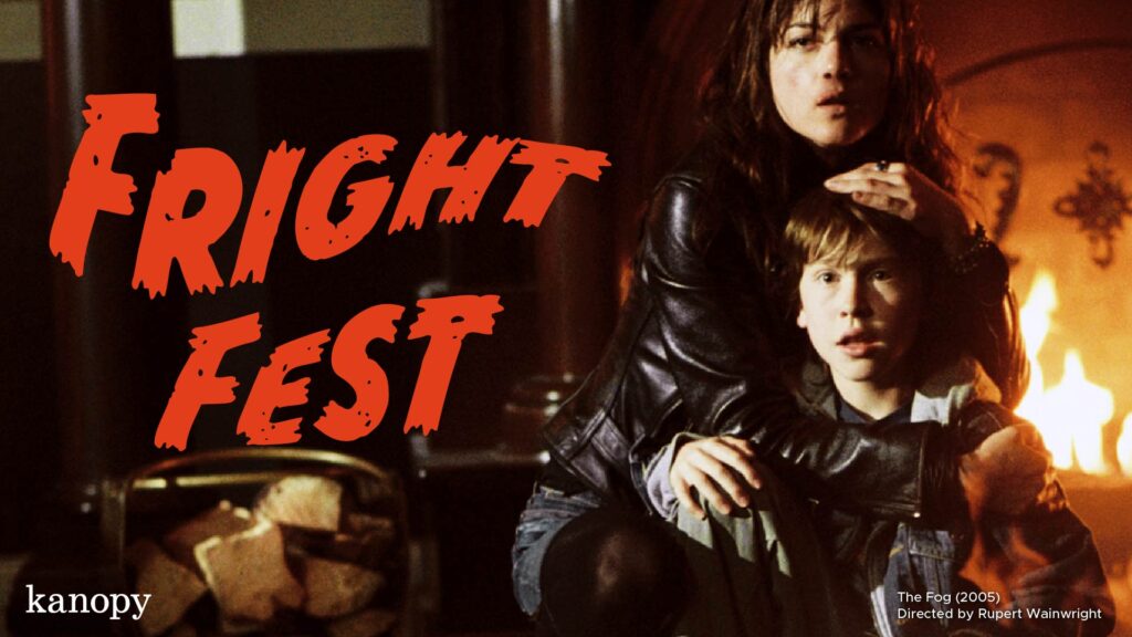 A scared woman hugs a boy by a fireplace with "Fright Fest" in bold red letters beside them.