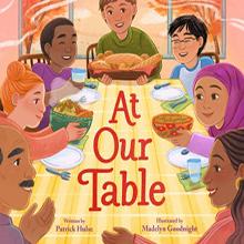 Illustration of a diverse group sharing a meal at a table, with the book title "At Our Table" in the center.