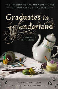 Book cover of "Graduates in Wonderland: A Memoir of Friendship" with plates, teapot, and dessert on a table.