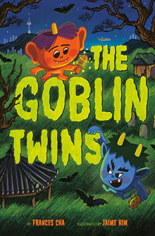 Two colorful goblin characters fly over a spooky landscape with the title "The Goblin Twins" in bold letters.