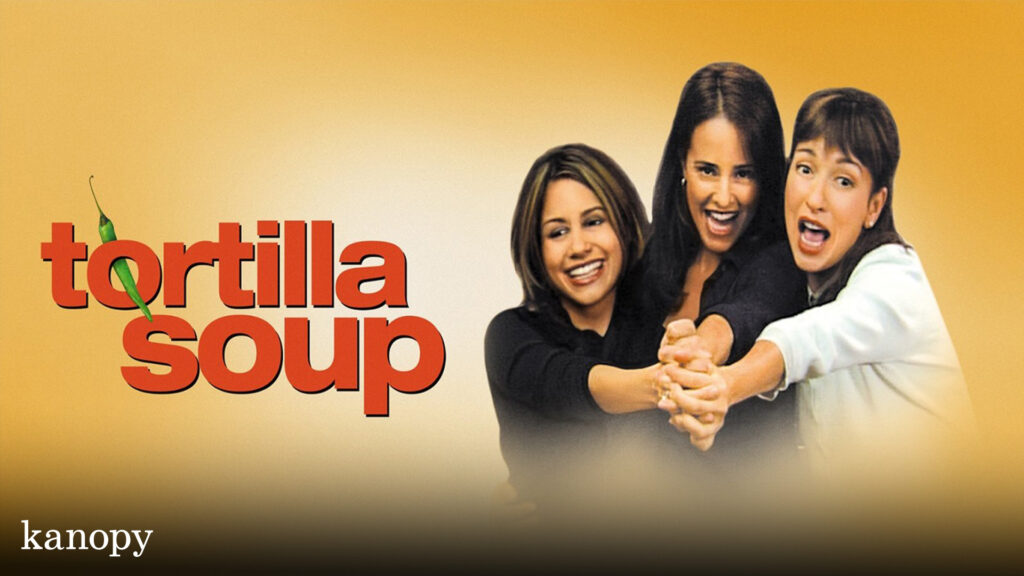 Three smiling women hold hands in front of a yellow background with the text "tortilla soup" and "kanopy".