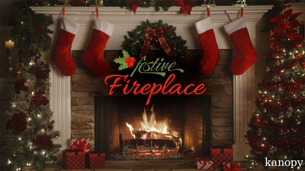 A cozy fireplace with stockings, holiday decorations, and gifts, with the text "Festive Fireplace.