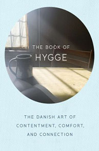 The Book of Hygge" cover featuring natural light on a table with a mug; subtitle: "The Danish Art of Contentment, Comfort, and Connection.