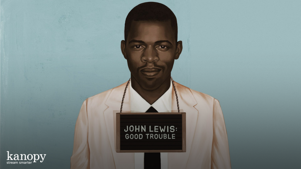 Illustration of a man in a white suit with a sign reading "John Lewis: Good Trouble" around his neck.