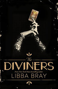 Book cover of "The Diviners" by Libba Bray; a hand holds a tarot card against a black background.