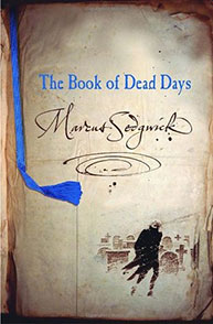 The cover of "The Book of Dead Days" by Marcus Sedgwick, featuring aged paper and a blue ribbon bookmark.