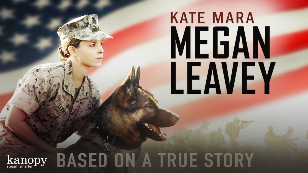 A female soldier and a German Shepherd in uniform, with an American flag and soldiers in the background.
