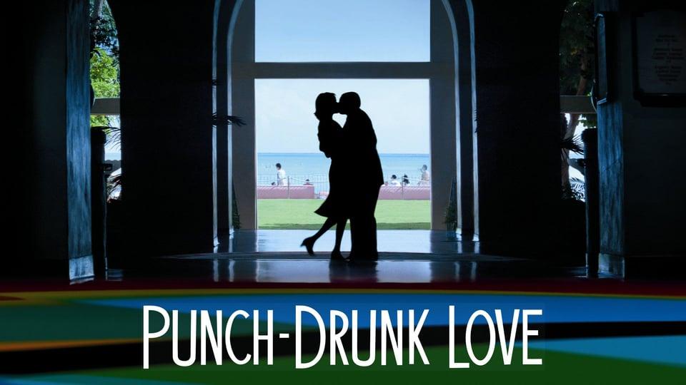 Silhouetted couple kissing in a doorway with "Punch-Drunk Love" text below. Bright outdoors in the background.