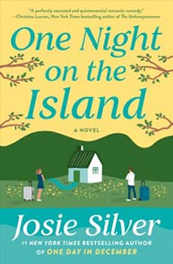 Book cover of "One Night on the Island" by Josie Silver, featuring a house surrounded by trees and two people with luggage.