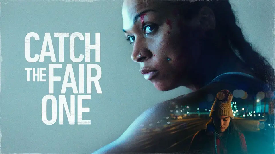 A serious woman with bruises looks ahead; text reads "Catch the Fair One." A small figure in a hat stands below.