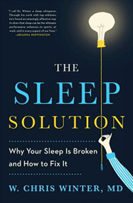 Cover of the book "The Sleep Solution" featuring a hand holding a glowing light bulb with the subtitle "Why Your Sleep Is Broken and How to Fix It.