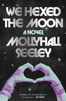 Book cover: "We Hexed the Moon" by Mollyhall Seeley, with hands making a heart shape against a starry background.