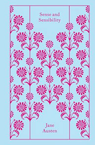 A blue book cover featuring pink floral patterns with the title "Sense and Sensibility" by Jane Austen.